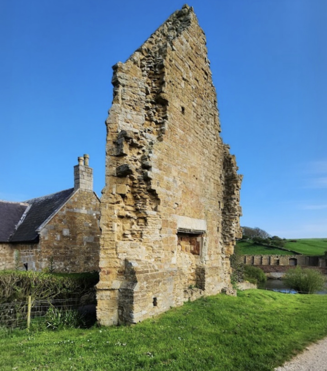 Historic ruins of Abbotsbury Abbey in Dorset countryside